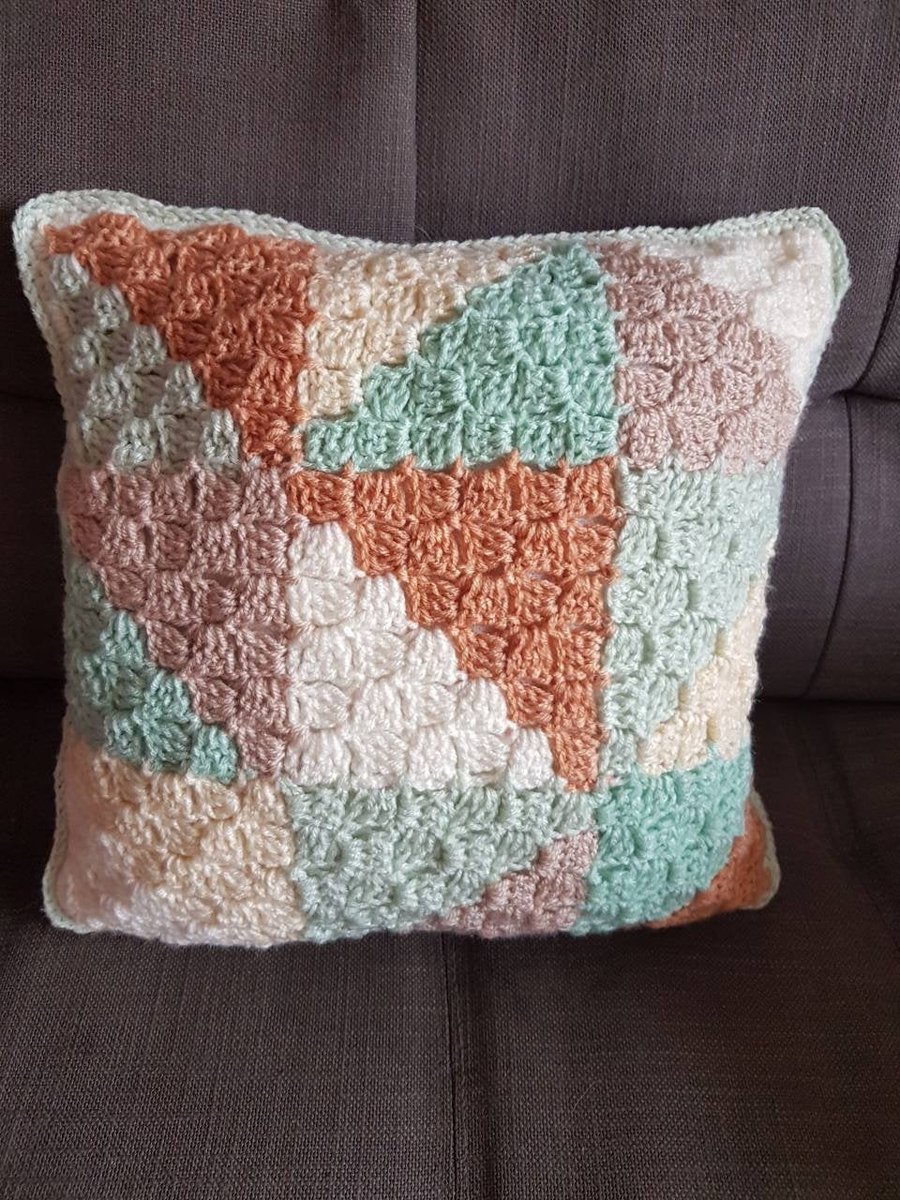 Pale pastel triangle pattern accent cushion
