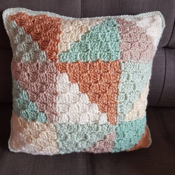 Pale pastel triangle pattern accent cushion