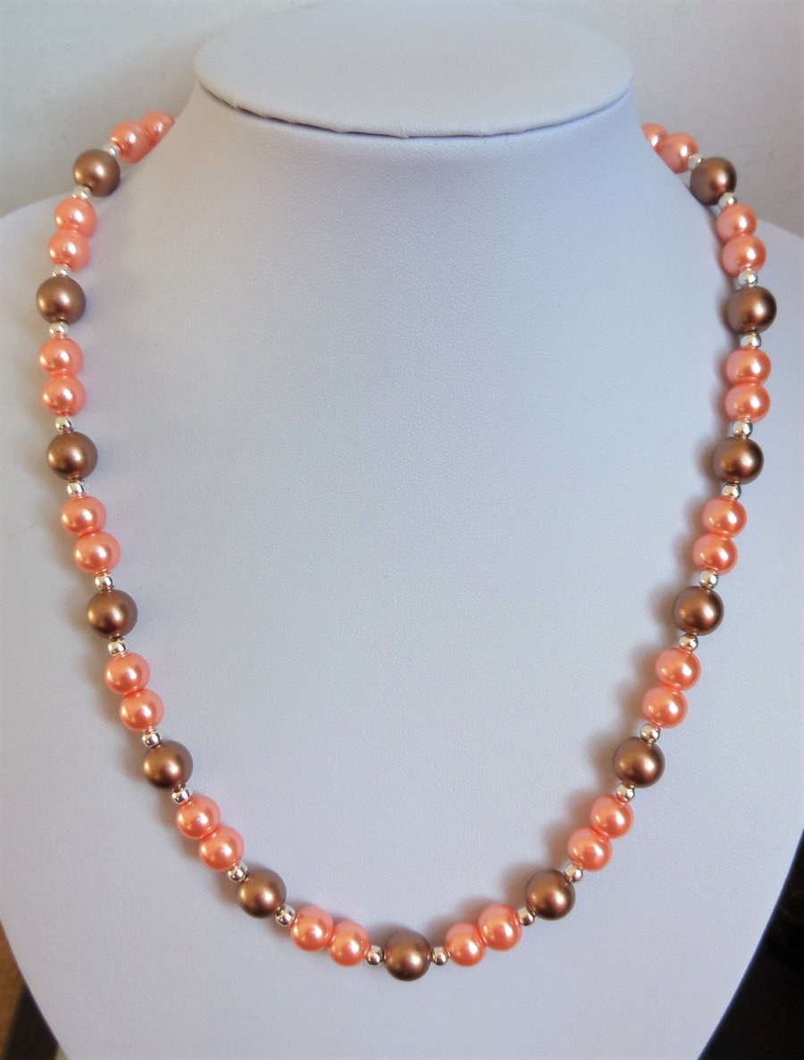 Peach and brown-bronze faux pearl bead necklace. 