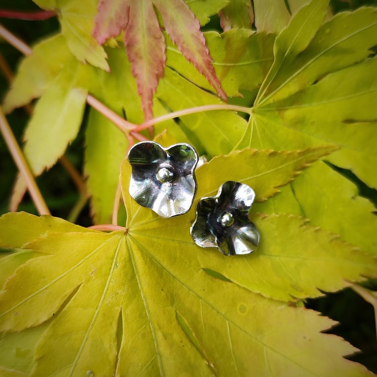 Silver floral studs earrings