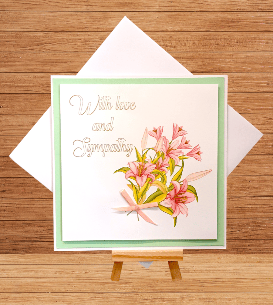 Delicate 'With love and sympathy' pink lily condolence card
