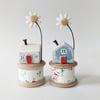 Wooden House on a Vintage Floral Bobbin with Clay Daisy