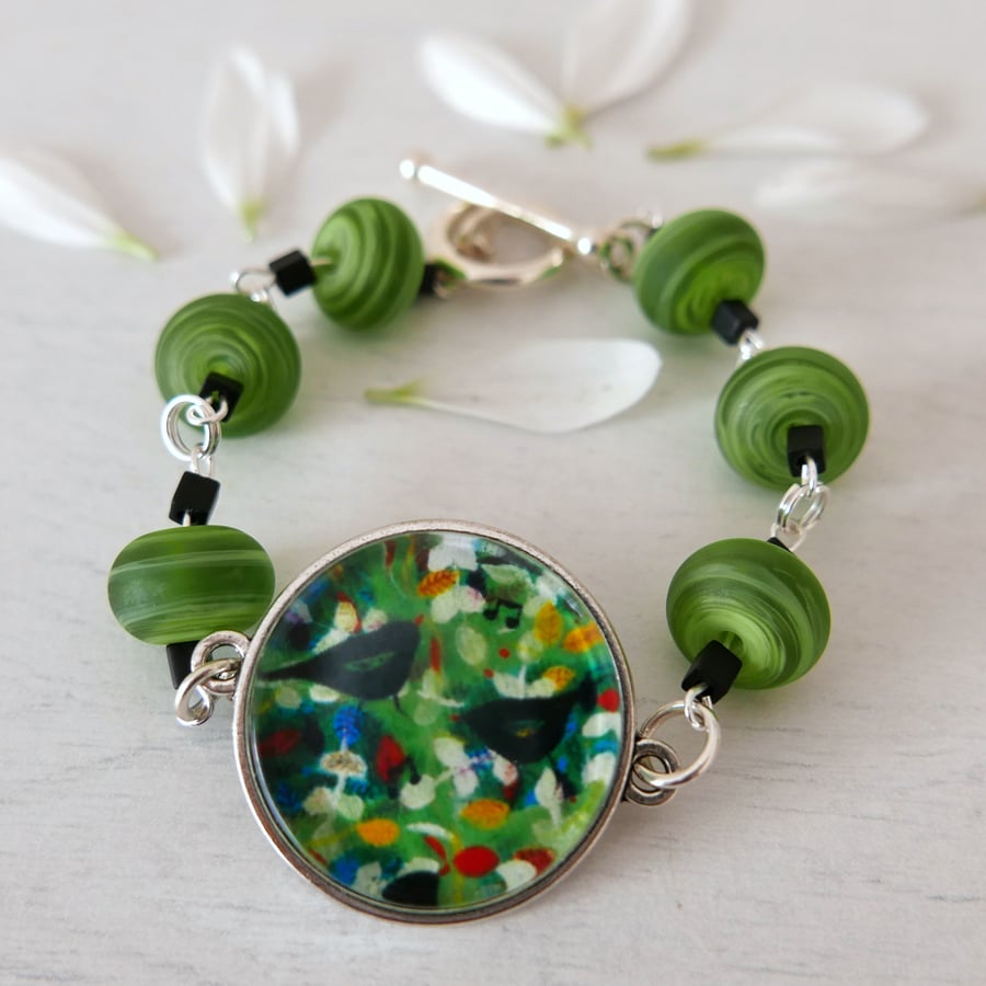 Green Bracelet with Black Bird Art Print, Lampwork Beads Jewellery 