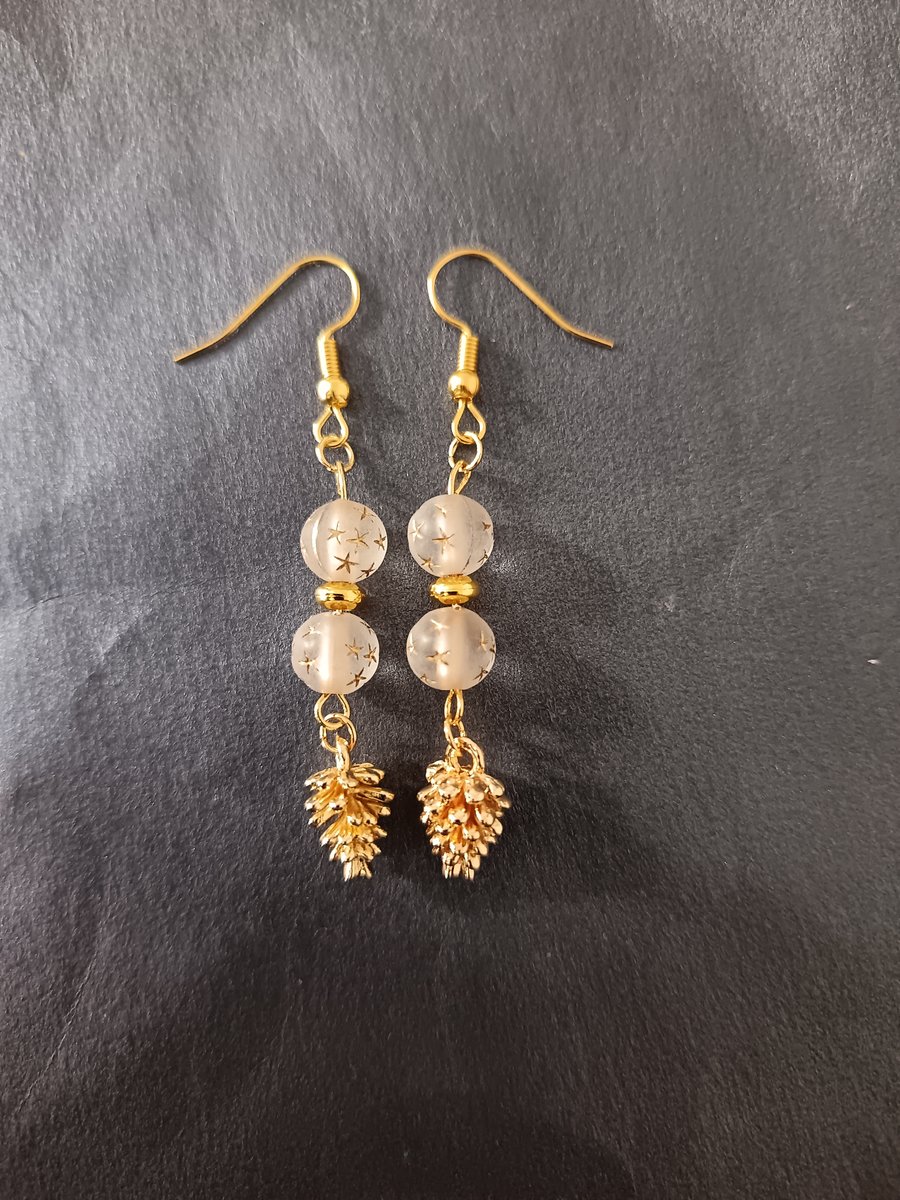 Gold pine cone charm dangle earrings with star detail beads