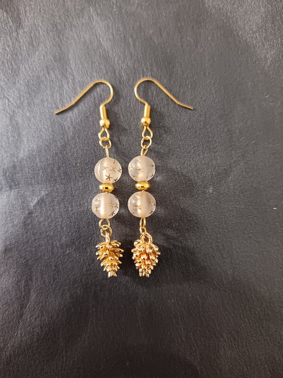 Gold pine cone charm dangle earrings with star detail beads