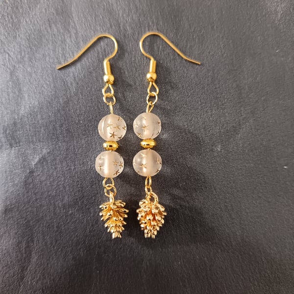Gold pine cone charm dangle earrings with star detail beads