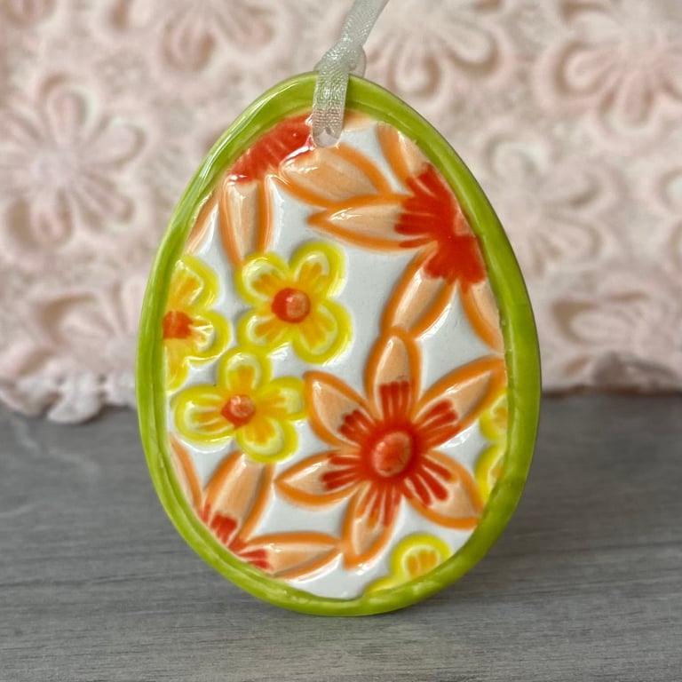 Pottery Easter Egg decoration with orange flowers