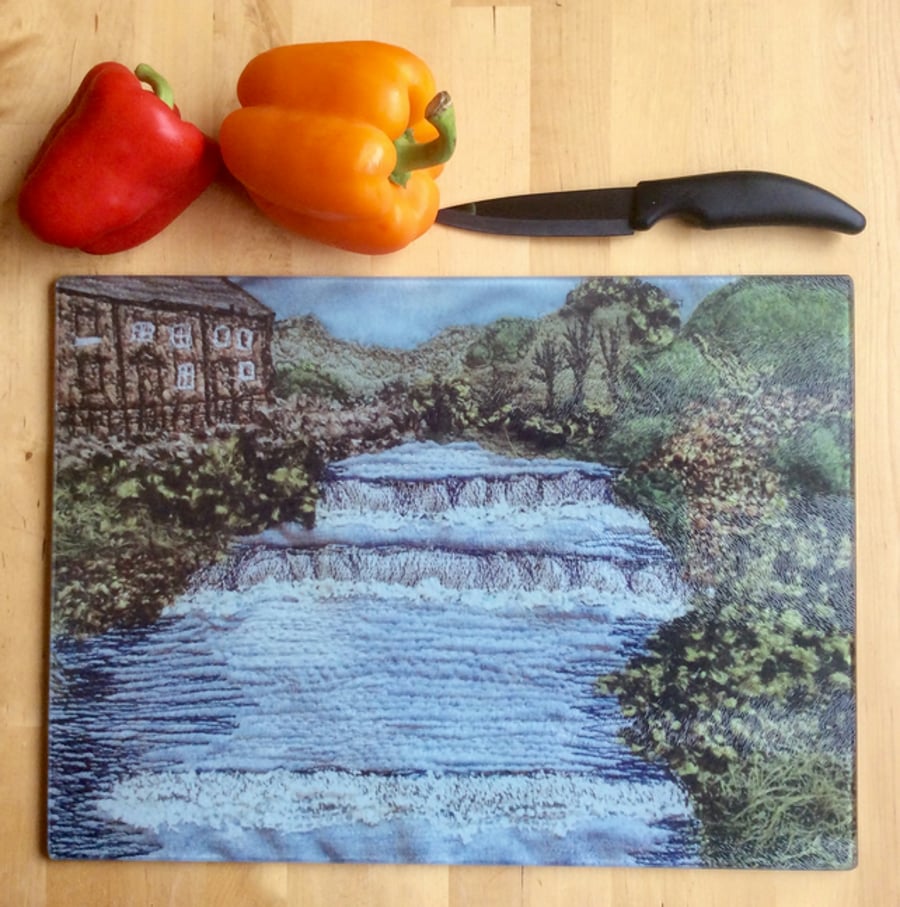 Glass chopping board, bread board or work top saver.