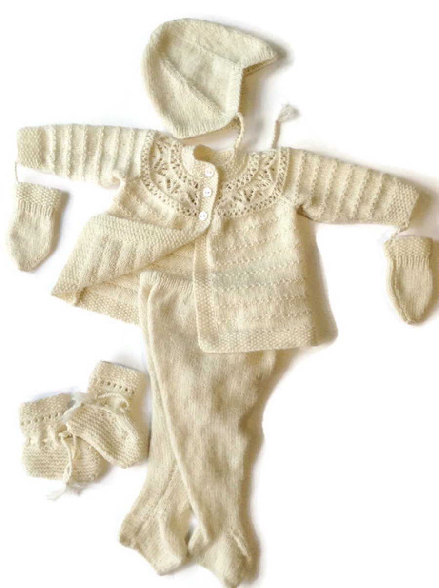 Cashmere pramsuit hand knitted to order