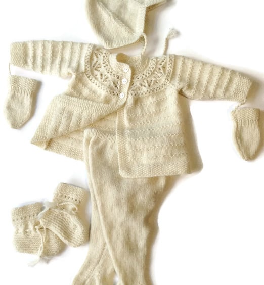 Cashmere pramsuit hand knitted to order