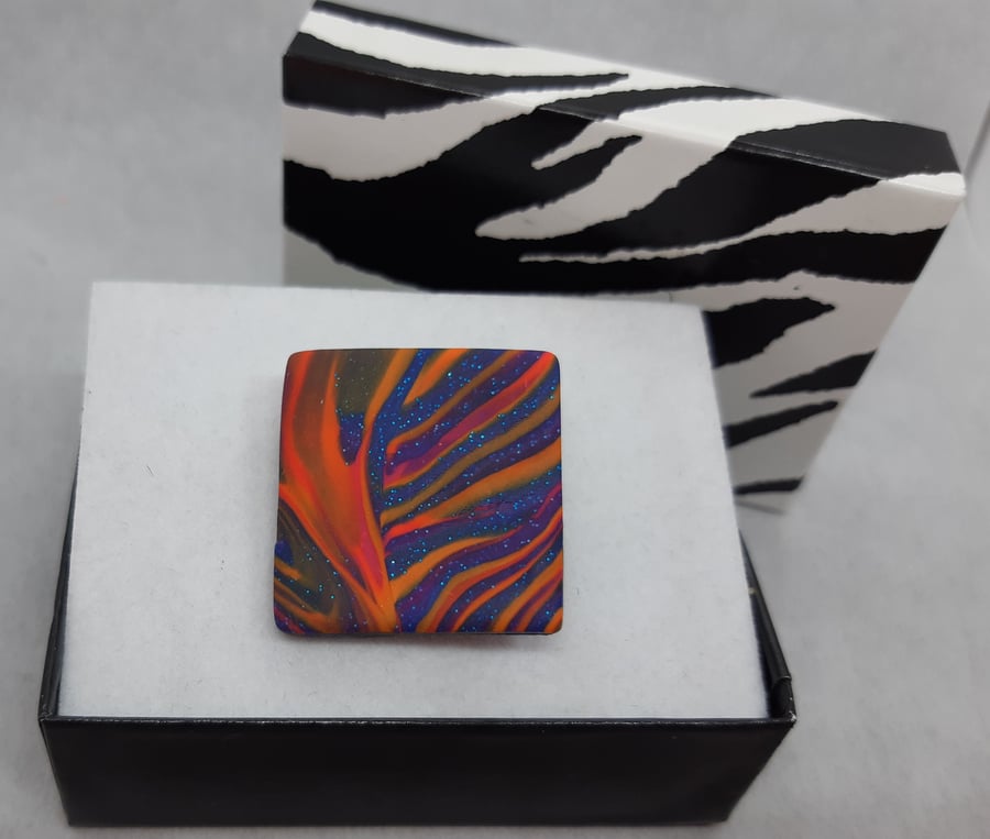 Distinctive colourful polymer clay brooch