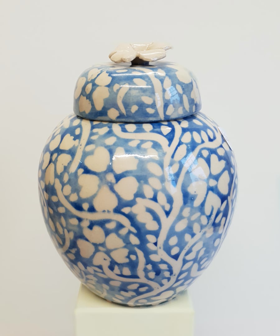 Storage jar or container in cream stoneware with blue and white floral design