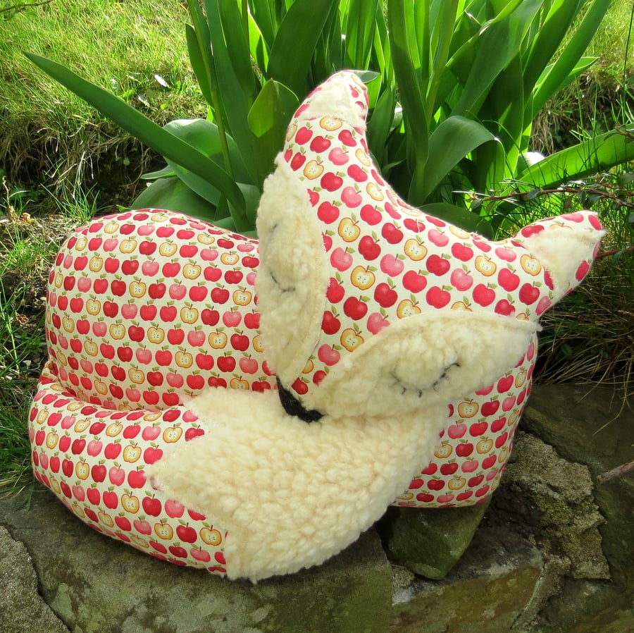 A snoozy fox cushion. Fox pillow. 33cm in length. (13 inches)