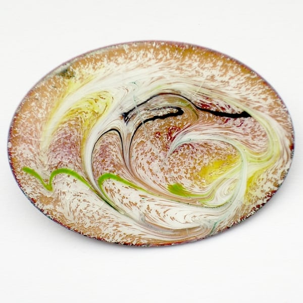 Enamel brooch - scrolled white, yellow, green and black over pale red-brown