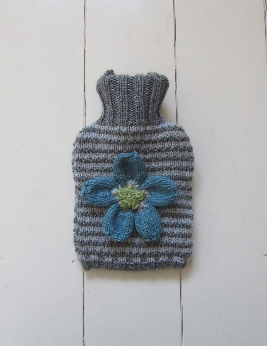 Hot water bottle cover - grey stripes with knitted daisy