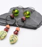 copper, green lampwork glass and ceramic earrings