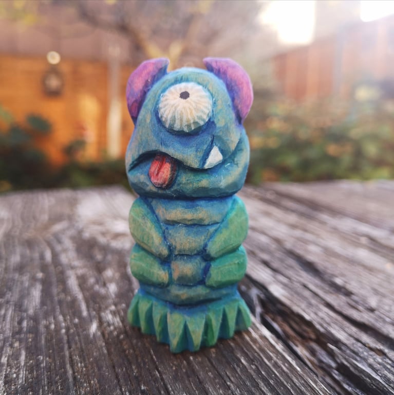 Hand carved, painted and finished wooden monster - creepy and cute!