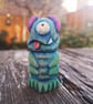 Hand carved, painted and finished wooden monster - creepy and cute!