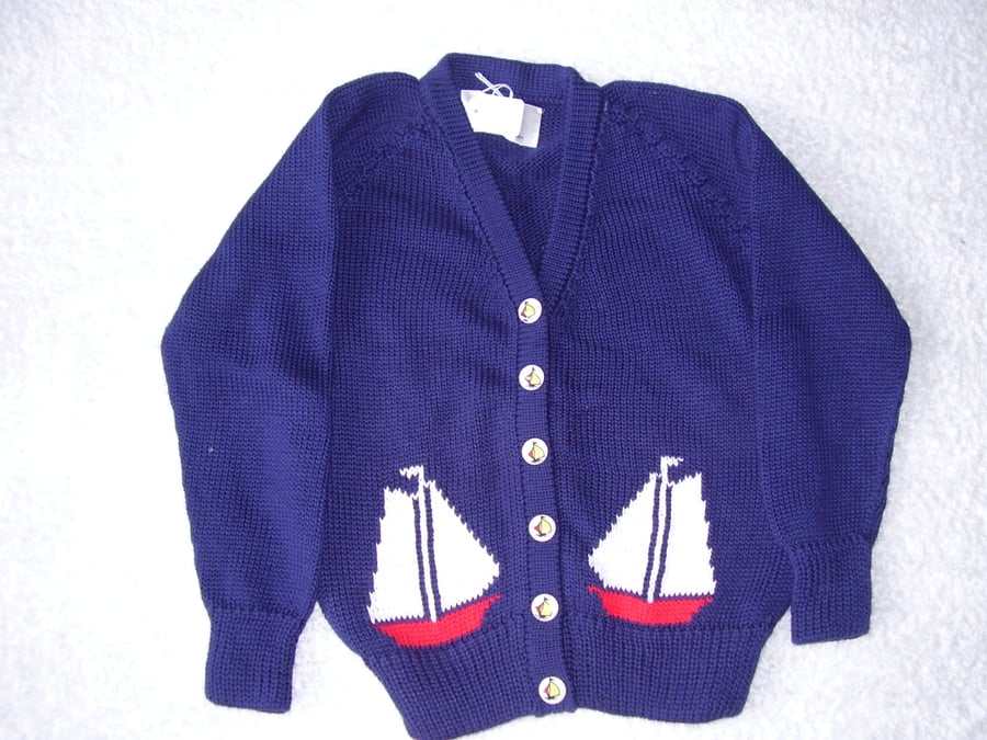Yacht Cardigan with yacht motifs and yacht buttons.