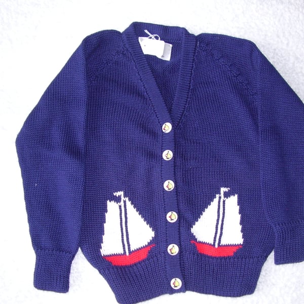 Yacht Cardigan with yacht motifs and yacht buttons.