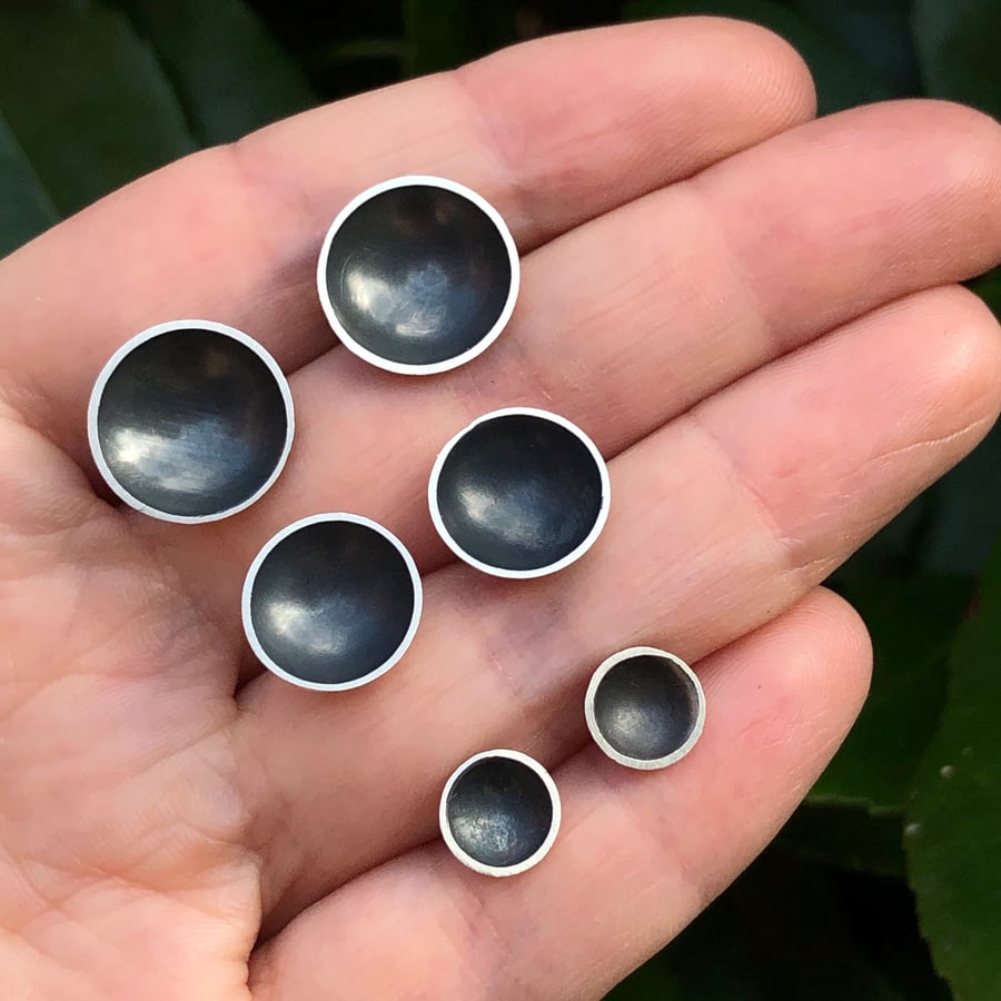 Sterling silver stud earring. Silver bowl earring with oxidised interior.