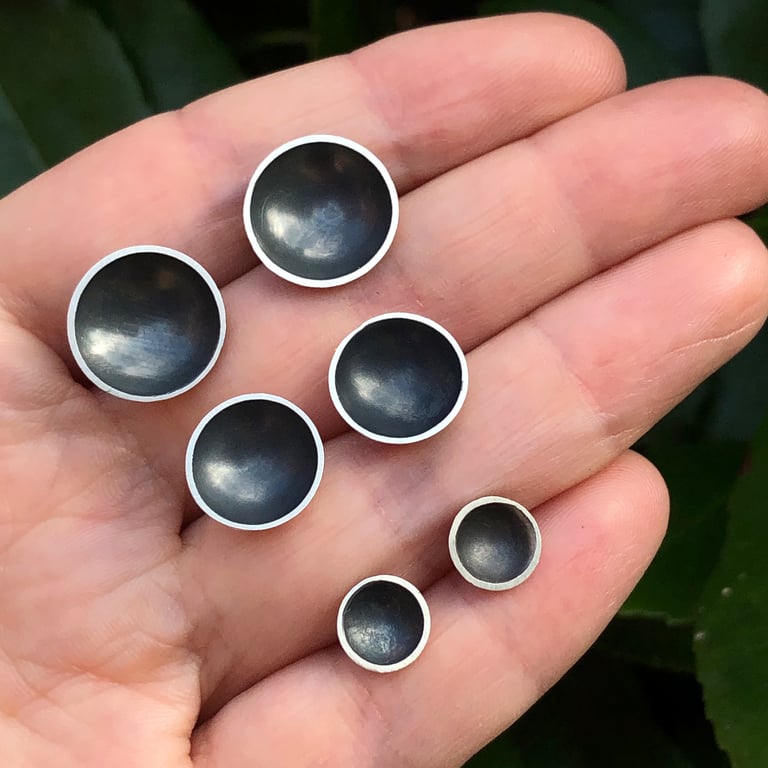 Sterling silver stud earring. Silver bowl earring with oxidised interior.