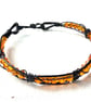 Caged Amber - black and orange bracelet