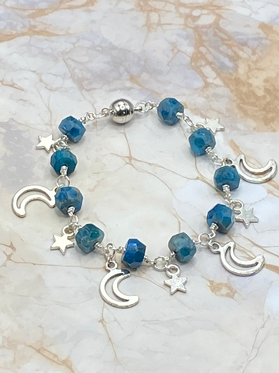 Moon and stars charm bracelet with blue apatite stones