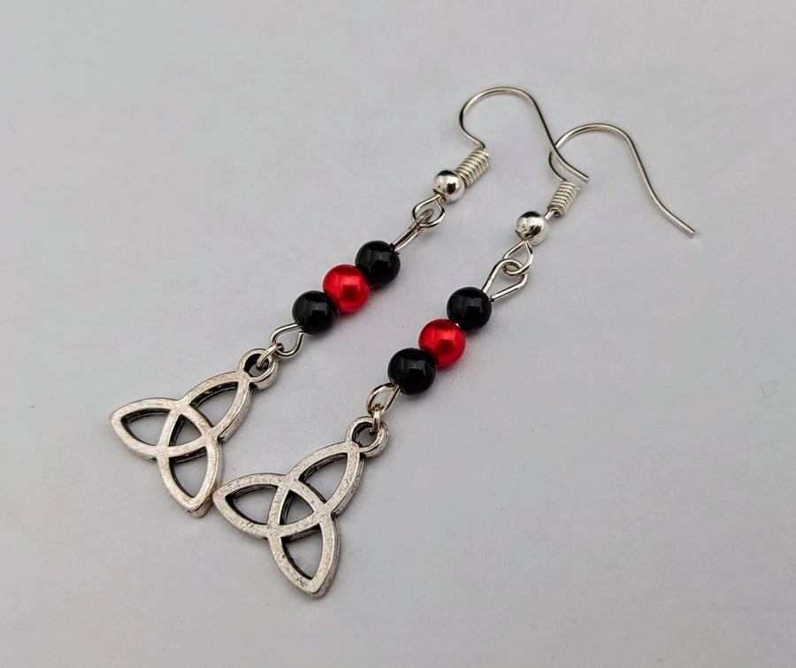 Celtic triquetra earrings with black and red beads