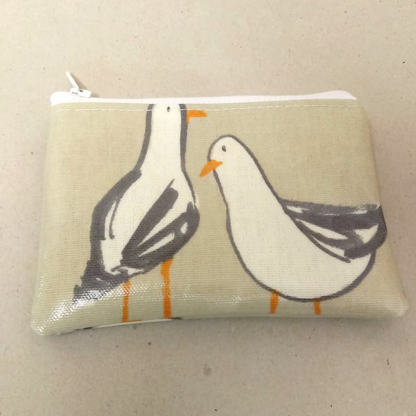 Coin purse in beige with seagulls pattern, handmade in oilcloth