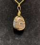 Beautiful wire wrapped brown pebble pendant on gold coloured chain.  - Image 3