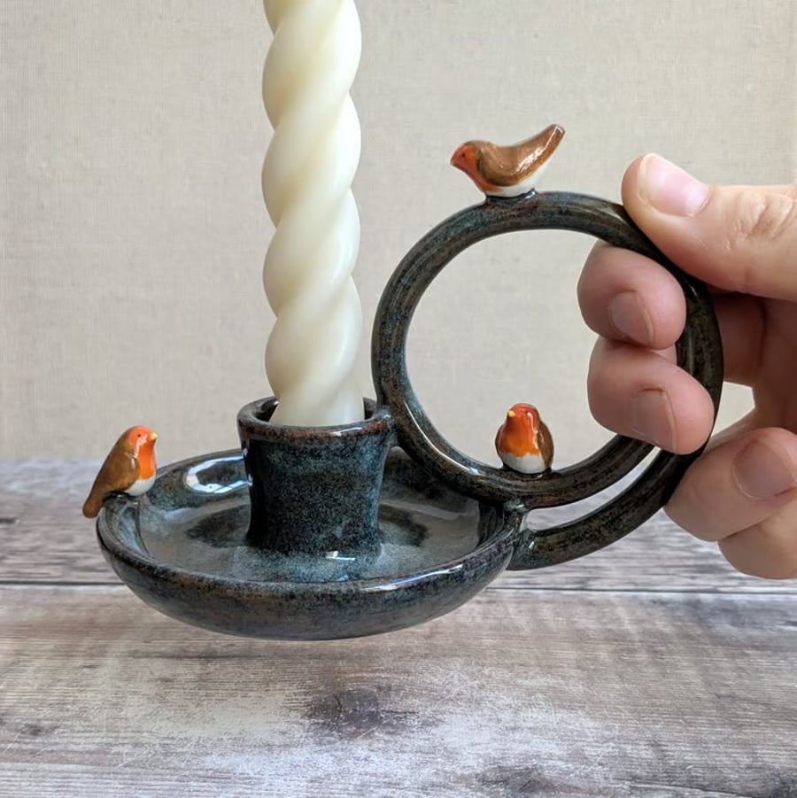 Ceramic taper candle holder with mini robins, brown blue glaze