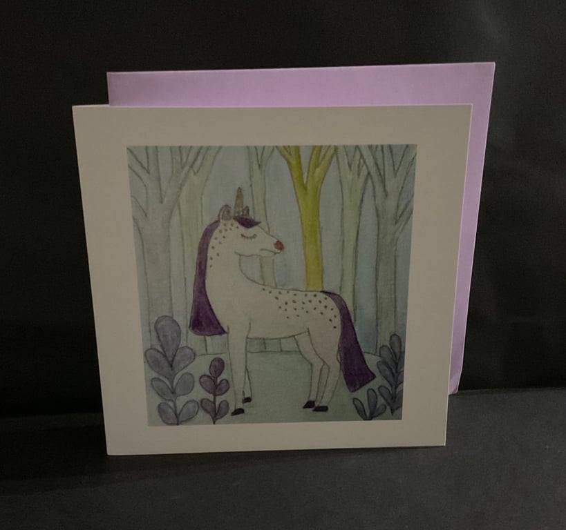 Unicorn in a magical forest blank greetings card 