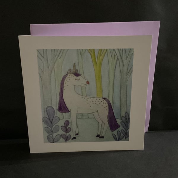 Unicorn in a magical forest blank greetings card 