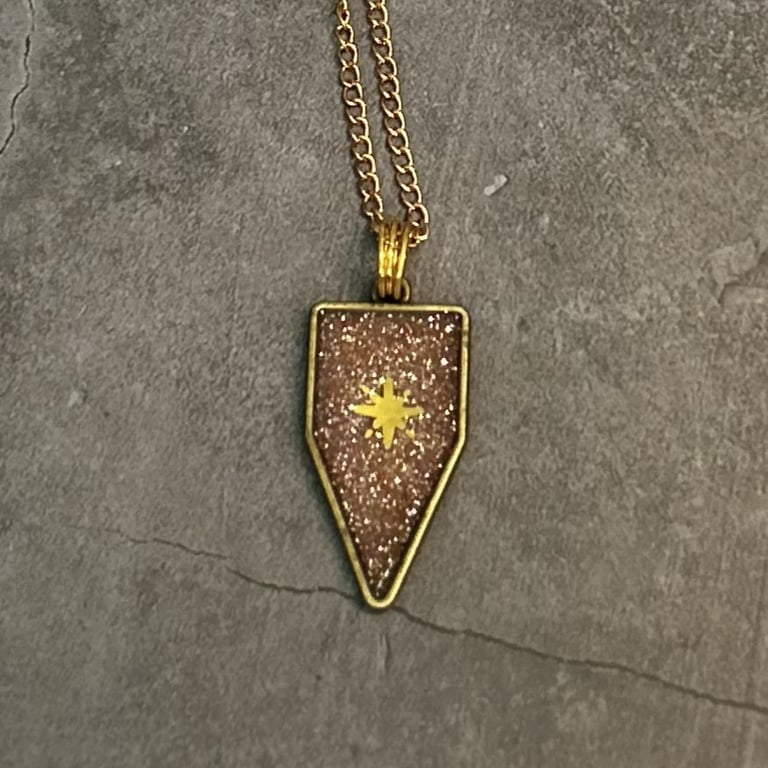 Celestial Star Necklace – Resin Pendant in Bronze Crest Caelestis