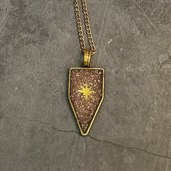 Celestial Star Necklace – Resin Pendant in Bronze Crest Caelestis