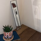 Poppy mirror.