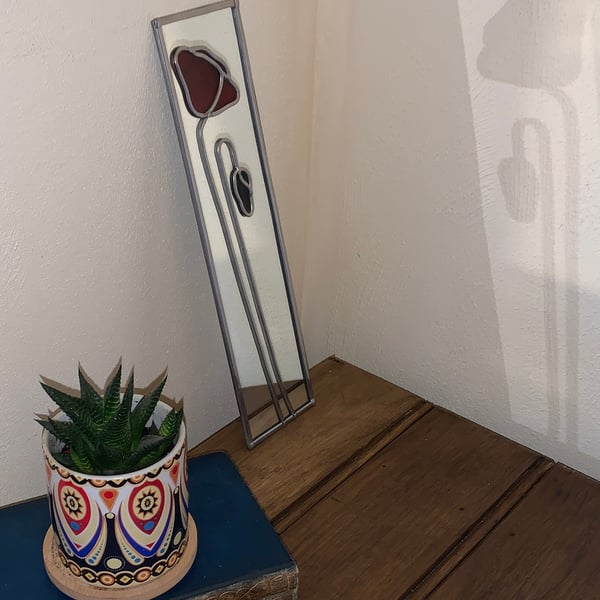 Poppy mirror.