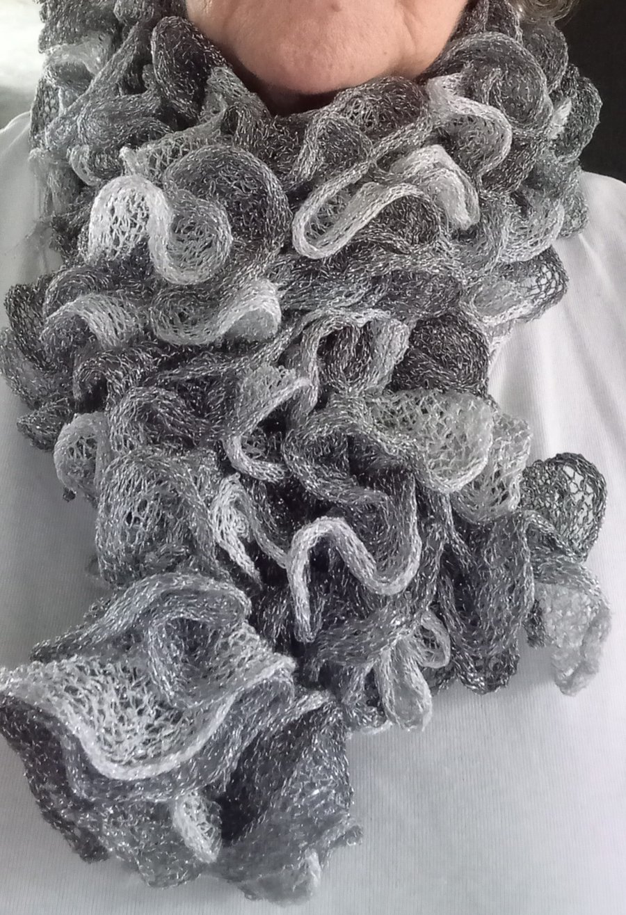 Silver grey frilly scarf with glitter