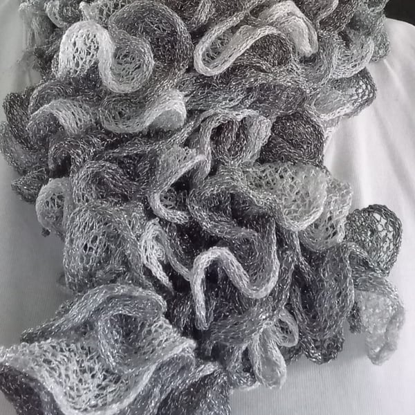 Silver grey frilly scarf with glitter