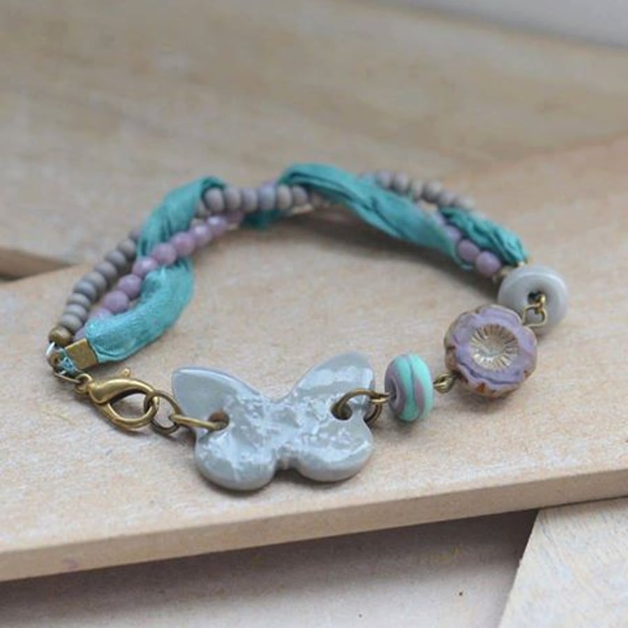 Bracelet with ceramic Grey Butterfly, Lampwork Beads, Flower and Ribbon