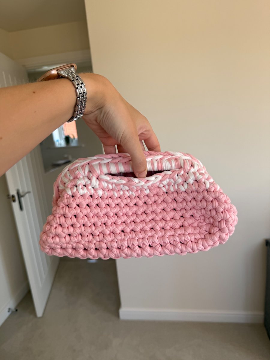 Handmade pink and white crochet clutch bag 