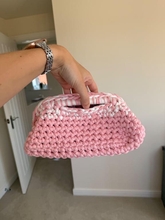 Handmade pink and white crochet clutch bag 