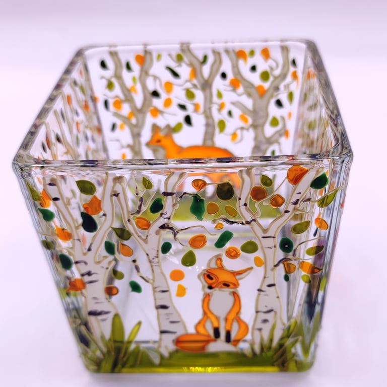 Hand painted glass candle holder, foxes in the autumn birch woods