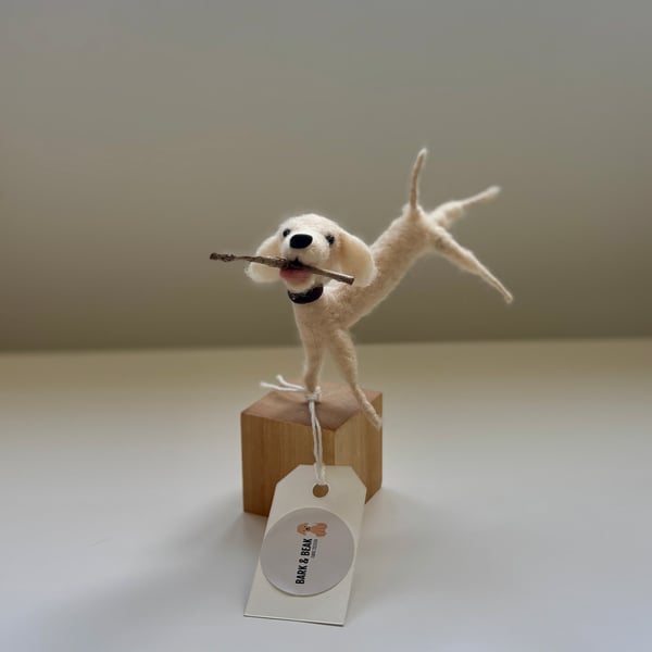 Needle felt whimsical dog fetching a stick. 10cm tall 