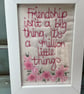 Friendship isn't a big thing ,it's a million little things.Embroidered picture.