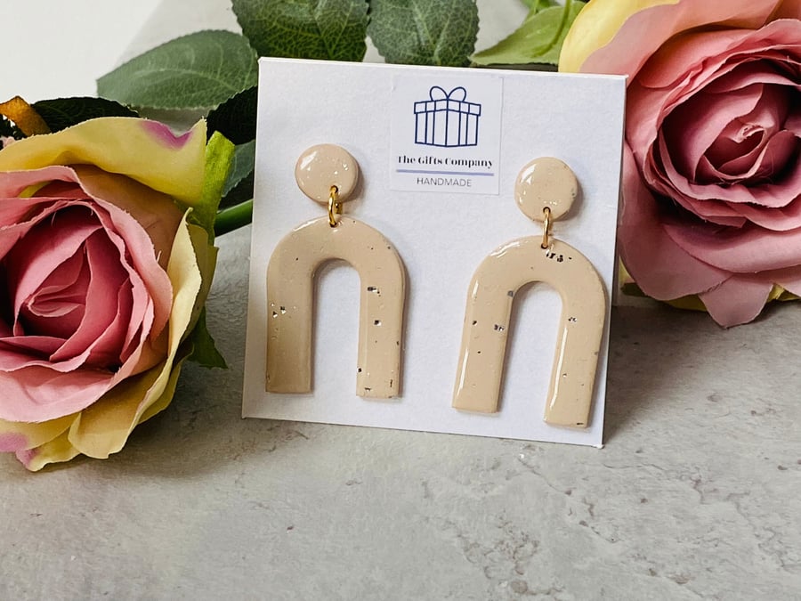 Beige and silver polymer clay, gold plated dangle earrings with resin finish