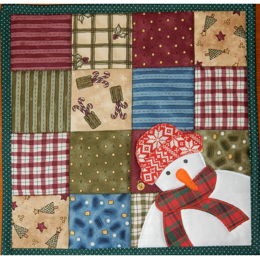 Snowman and patchwork place mat