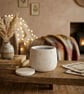 Black Candle Filled White Starry Jar with Lid - Image 1