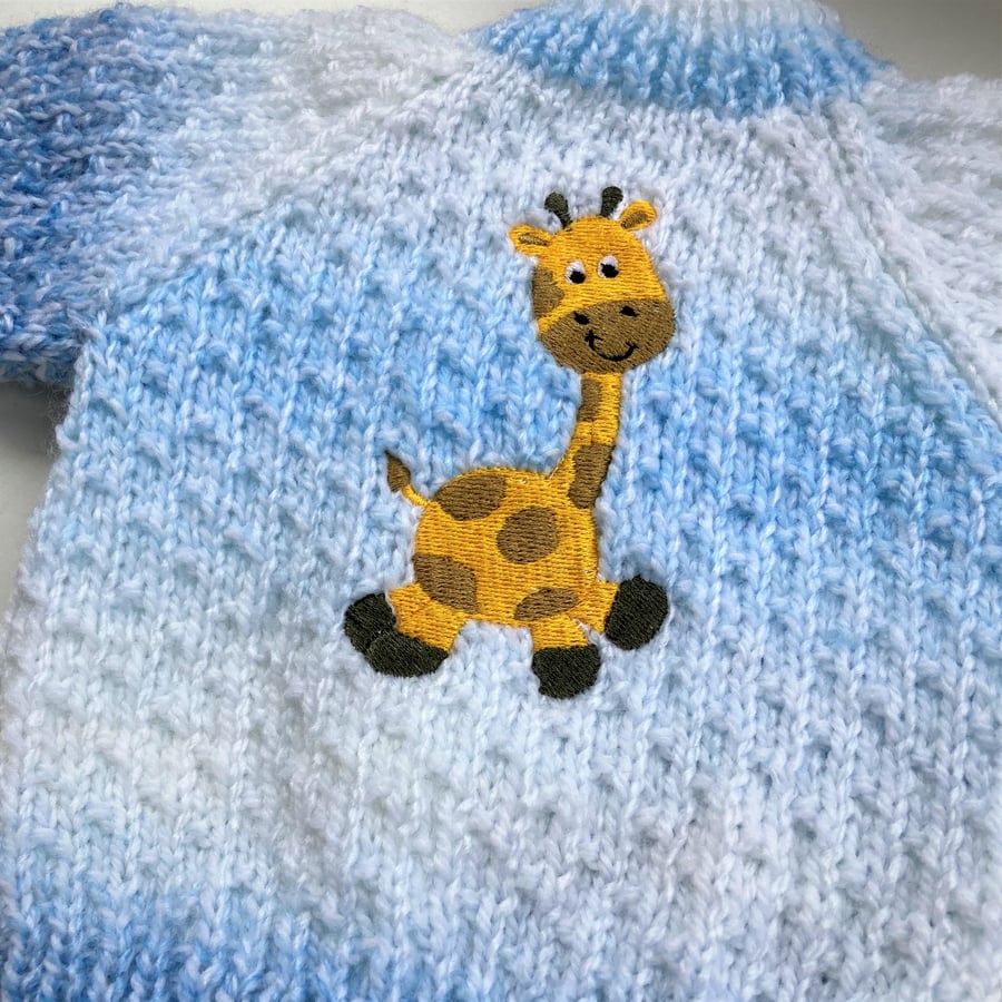 Hand knitted baby cardigan - newborn - with giraffe embroidery